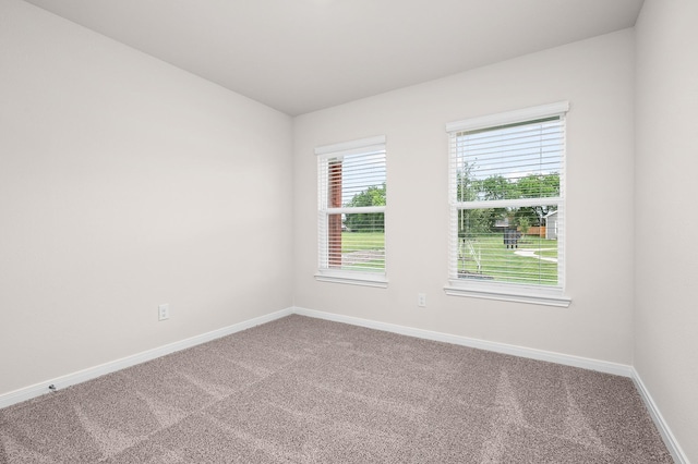 221 Southgate Dr, Terrell, TX 75160 - carpeted spare room featuring baseboards