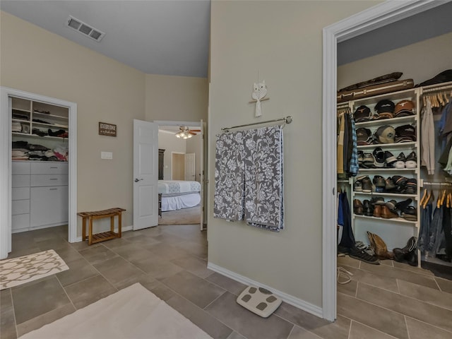 4305 Diplomacy Dr, Rowlett, TX 75089 - bathroom featuring tile patterned flooring, ensuite bathroom, ceiling fan, and baseboards