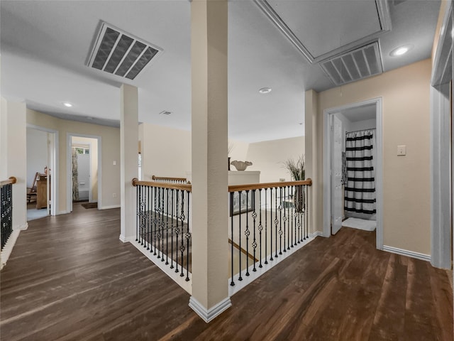 4305 Diplomacy Dr, Rowlett, TX 75089 - hallway featuring attic access, wood finished floors, an upstairs landing, baseboards, and recessed lighting
