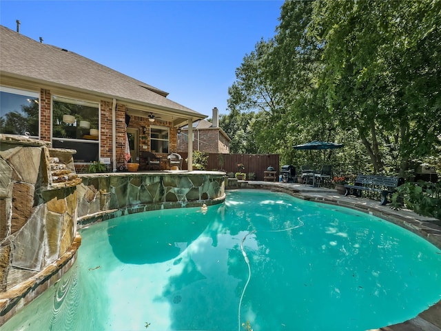 4305 Diplomacy Dr, Rowlett, TX 75089 - view of swimming pool with a fenced backyard, a patio area, and ceiling fan
