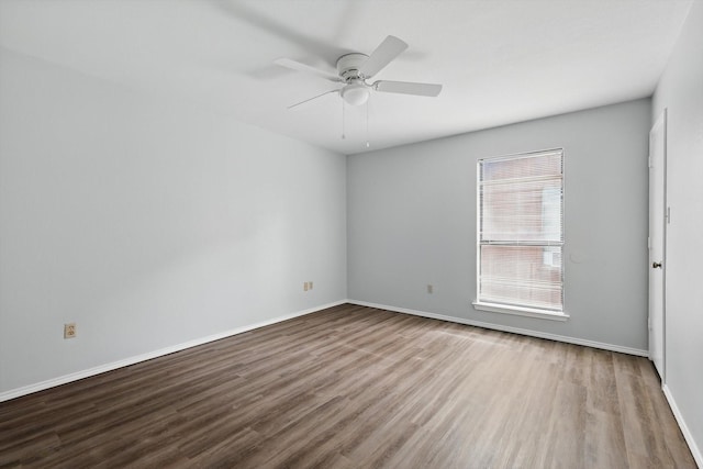 7710 Sable Ln, North Richland Hills, TX 76182 - empty room featuring wood finished floors, baseboards, and a ceiling fan