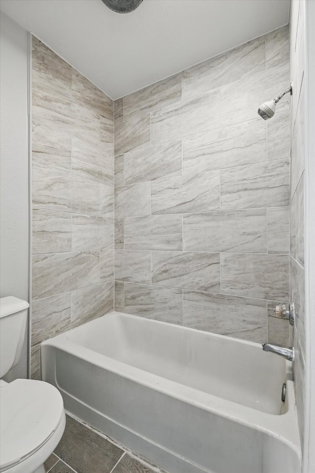 7710 Sable Ln, North Richland Hills, TX 76182 - bathroom with toilet, shower / bath combination, and tile patterned flooring