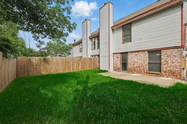 7710 Sable Ln, North Richland Hills, TX 76182 - rear view of property with brick siding and a chimney