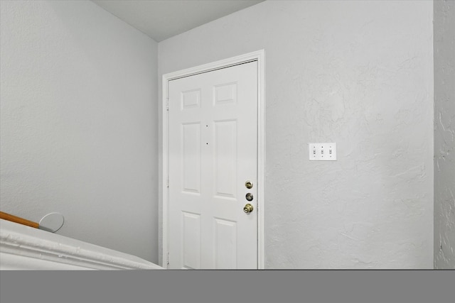 7710 Sable Ln, North Richland Hills, TX 76182 - doorway featuring a textured wall