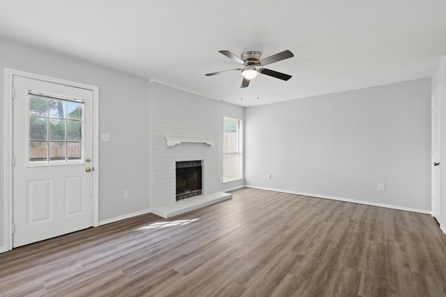 7710 Sable Ln, North Richland Hills, TX 76182 - unfurnished living room with healthy amount of natural light, ceiling fan, and wood finished floors