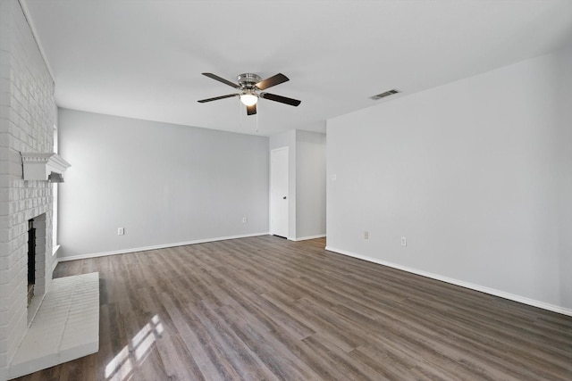 7710 Sable Ln, North Richland Hills, TX 76182 - unfurnished living room featuring ceiling fan, a fireplace, wood finished floors, and baseboards