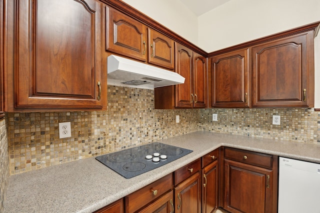 1086 Whispering Gln, Rockwall, TX 75087 - kitchen featuring under cabinet range hood, dishwasher, black electric stovetop, light countertops, and backsplash