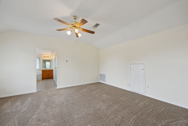 1086 Whispering Gln, Rockwall, TX 75087 - unfurnished room featuring vaulted ceiling, light colored carpet, a ceiling fan, and baseboards