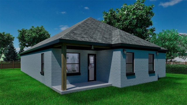 2006 Throckmorton St, Gainesville, TX 76240 - back of property featuring brick siding and roof with shingles