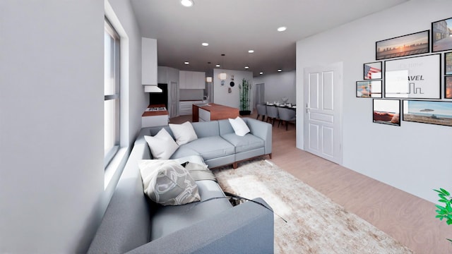2006 Throckmorton St, Gainesville, TX 76240 - living room featuring wood finished floors and recessed lighting