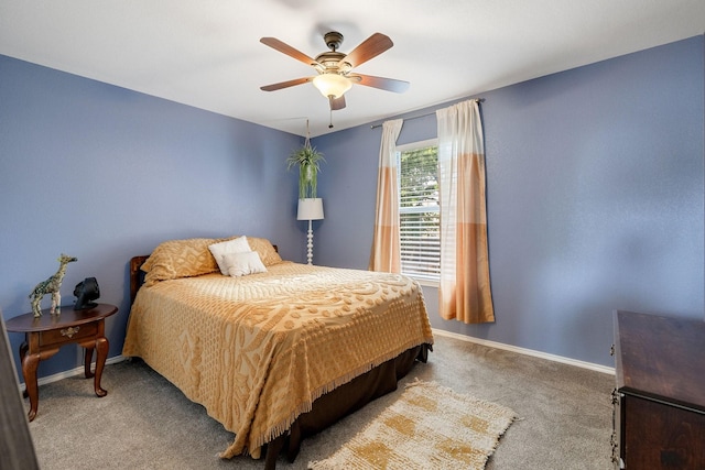 bedroom featuring carpet flooring, baseboards, and a ceiling fan