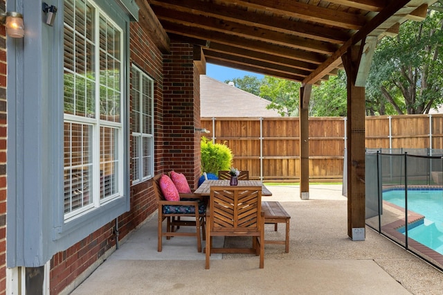 view of patio / terrace with a fenced backyard and outdoor dining area