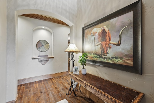 603 Comal Ct, Keller, TX 76248 - hallway featuring arched walkways and wood finished floors