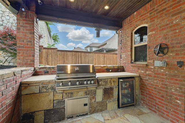 603 Comal Ct, Keller, TX 76248 - view of patio / terrace with a grill, fence, beverage cooler, and exterior kitchen