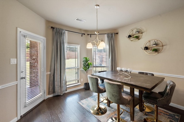 3449 Ava Dr, Midlothian, TX 76065 - dining area featuring baseboards, dark wood finished floors, and a chandelier