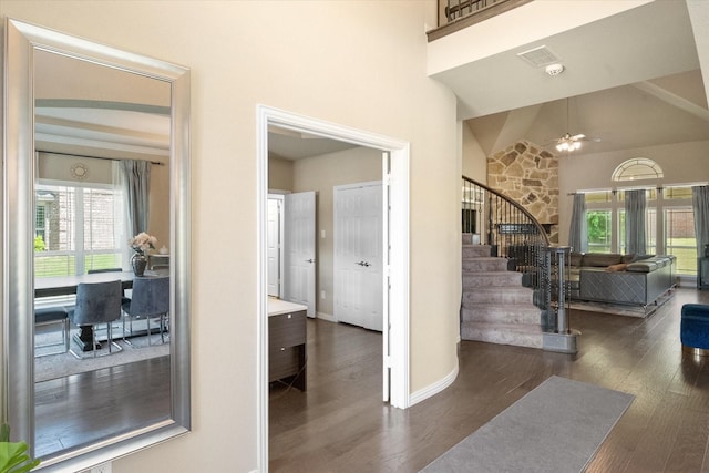 3449 Ava Dr, Midlothian, TX 76065 - entryway with stairway, a high ceiling, wood finished floors, a ceiling fan, and baseboards