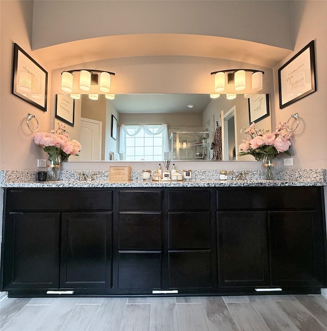 5202 Fallen Tree Dr, Temple, TX 76502 - full bathroom with a shower stall and double vanity