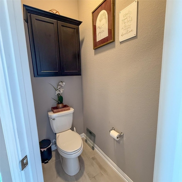 5202 Fallen Tree Dr, Temple, TX 76502 - bathroom with toilet and baseboards