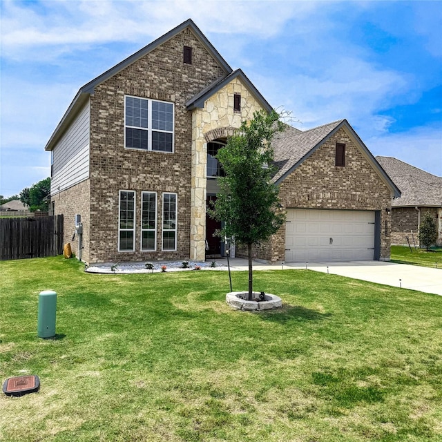 5202 Fallen Tree Dr, Temple, TX 76502 - view of front of home with brick siding, concrete driveway, and an attached garage
