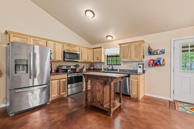7909 W Fm 1753, Ravenna, TX 75476 - kitchen featuring stainless steel appliances, a sink, concrete flooring, light brown cabinetry, and lofted ceiling