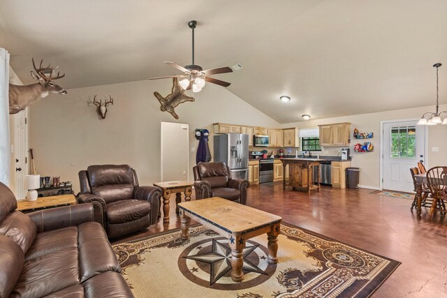 7909 W Fm 1753, Ravenna, TX 75476 - living room featuring ceiling fan, a chandelier, finished concrete floors, and high vaulted ceiling