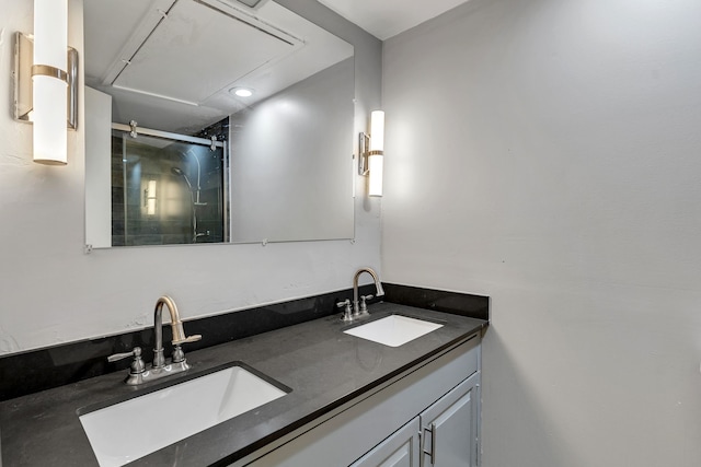 10240 Regal Oaks Dr Unit C, Dallas, TX 75230 - bathroom with a shower stall and double vanity