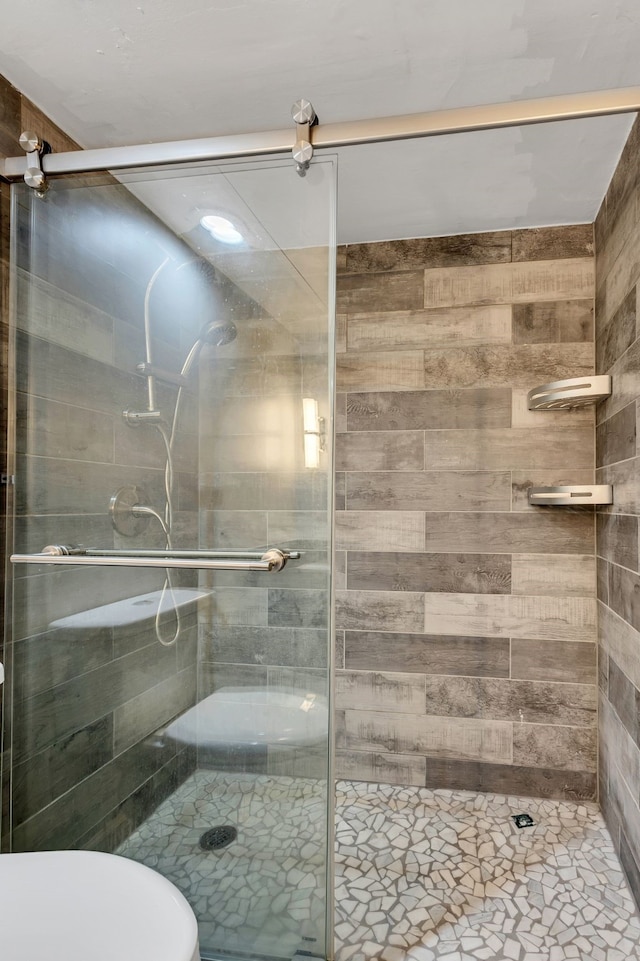 10240 Regal Oaks Dr Unit C, Dallas, TX 75230 - full bathroom with a shower stall and toilet