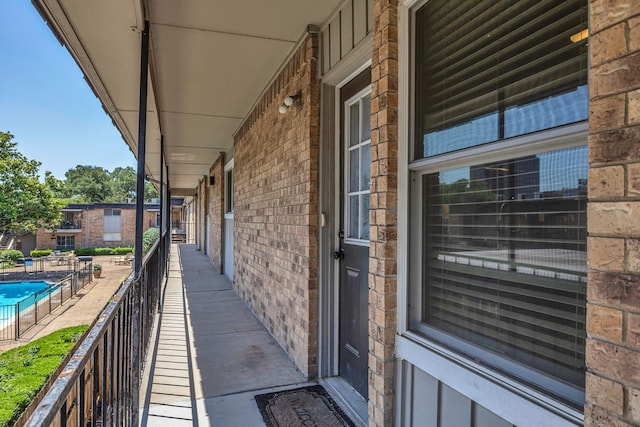 10240 Regal Oaks Dr Unit C, Dallas, TX 75230 - balcony featuring view of pool