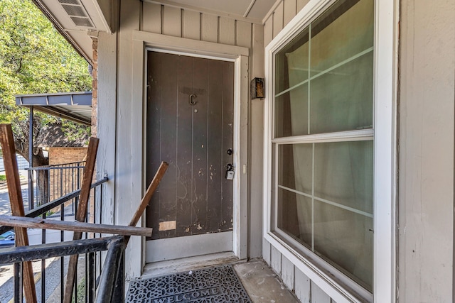 10240 Regal Oaks Dr Unit C, Dallas, TX 75230 - property entrance with board and batten siding