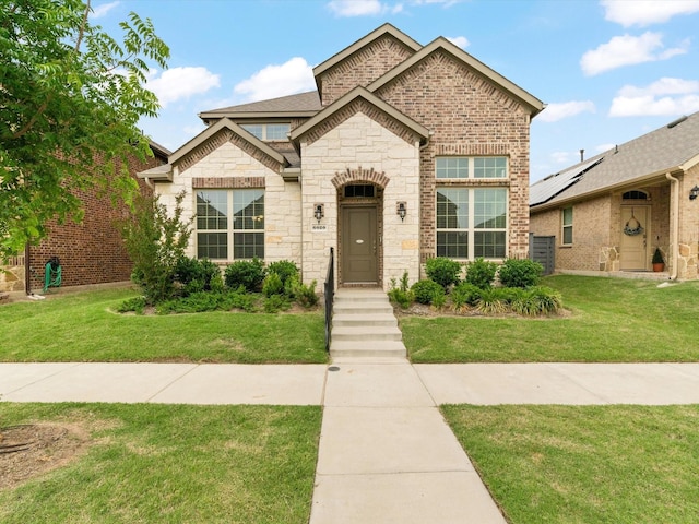 6020 Paddock Ln, Little Elm, TX 76227 - french country home with stone siding and a front yard