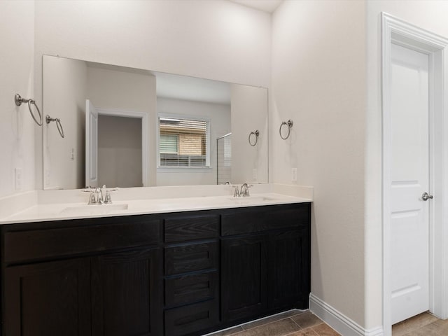 6020 Paddock Ln, Little Elm, TX 76227 - full bath featuring baseboards, double vanity, and a shower with shower door