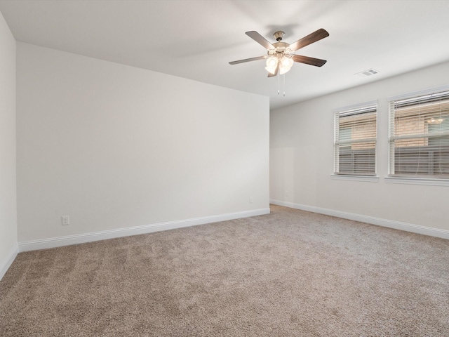 6020 Paddock Ln, Little Elm, TX 76227 - unfurnished room with light colored carpet, baseboards, and ceiling fan