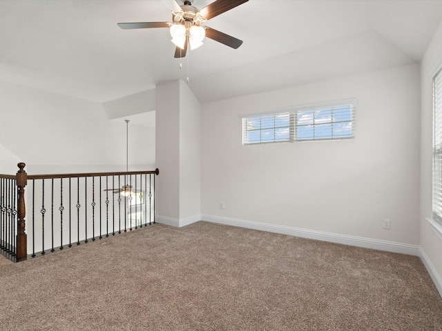 6020 Paddock Ln, Little Elm, TX 76227 - spare room featuring a ceiling fan, carpet flooring, lofted ceiling, and baseboards