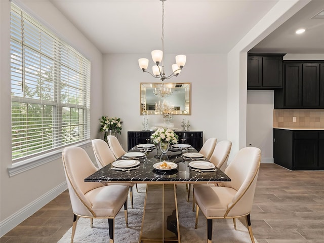 6020 Paddock Ln, Little Elm, TX 76227 - dining area featuring a chandelier, baseboards, light wood finished floors, and recessed lighting