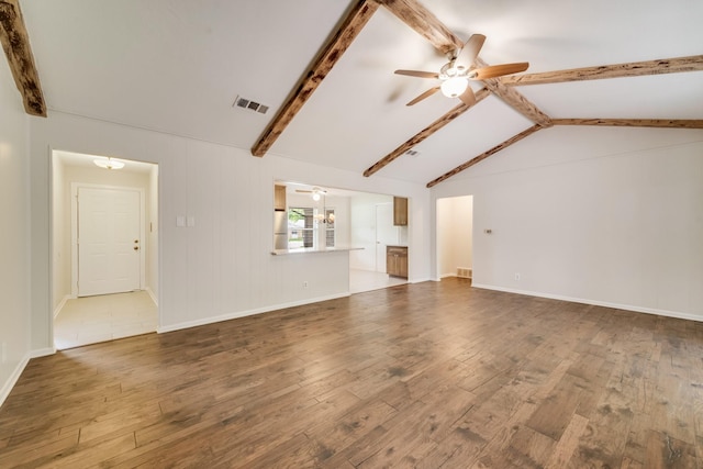 926 Meadowbrook Dr, Grapevine, TX 76051 - unfurnished living room with ceiling fan, wood finished floors, and baseboards