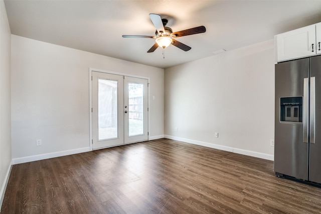 unfurnished room featuring a ceiling fan, dark wood-style floors, french doors, and baseboards