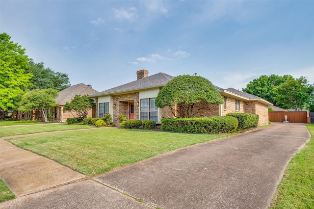 2512 Shadow Lane Dr, Mckinney, TX 75072 - view of front of home with brick siding and a chimney