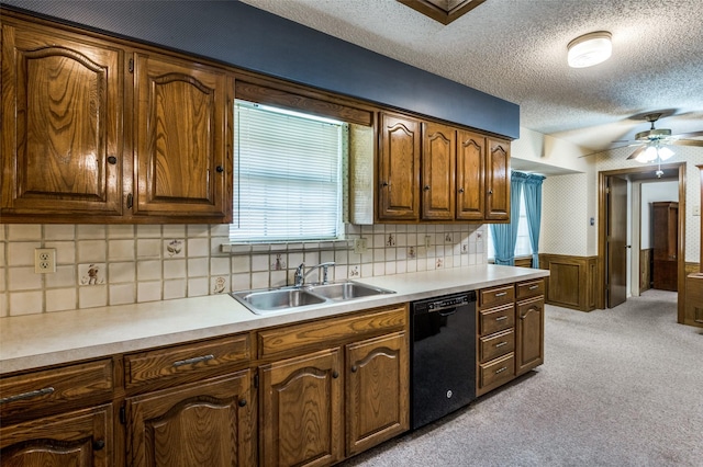 2512 Shadow Lane Dr, Mckinney, TX 75072 - kitchen with a sink, black dishwasher, light countertops, a ceiling fan, and a textured ceiling