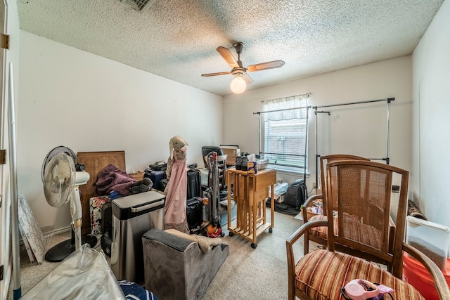 2138 Wellington Dr, Grand Prairie, TX 75051 - carpeted bedroom with a textured ceiling and ceiling fan