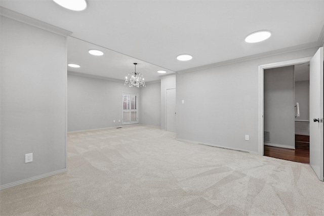 202 Rainbow Cir, Rockwall, TX 75032 - carpeted spare room featuring crown molding, a chandelier, baseboards, and recessed lighting