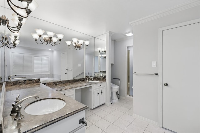 202 Rainbow Cir, Rockwall, TX 75032 - bathroom featuring a chandelier, crown molding, double vanity, tile patterned floors, and baseboards