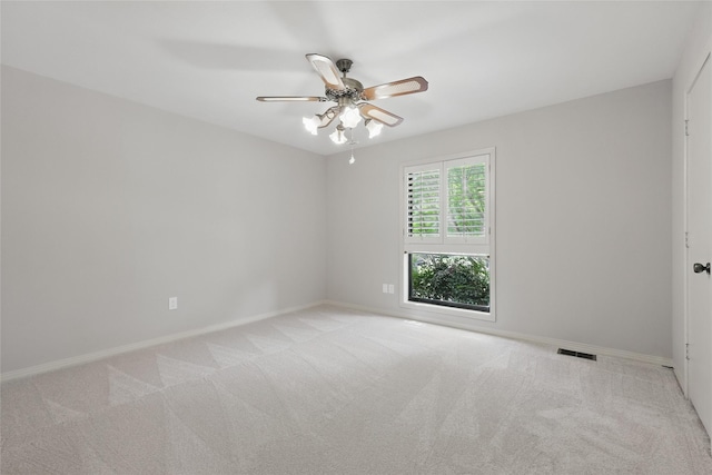 202 Rainbow Cir, Rockwall, TX 75032 - spare room with light carpet, a ceiling fan, and baseboards