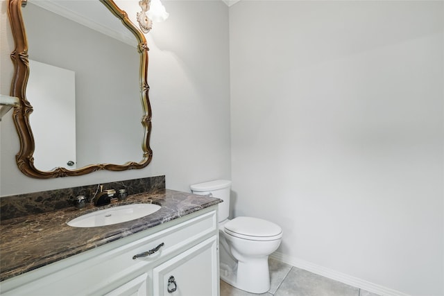 202 Rainbow Cir, Rockwall, TX 75032 - half bath featuring tile patterned floors, vanity, toilet, and baseboards