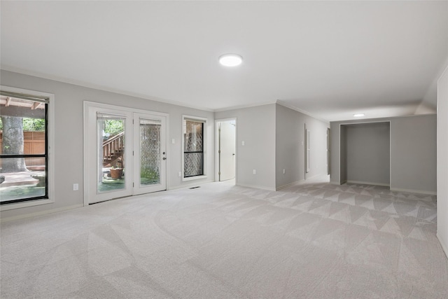 202 Rainbow Cir, Rockwall, TX 75032 - empty room with light carpet, baseboards, and crown molding
