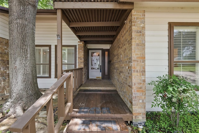 202 Rainbow Cir, Rockwall, TX 75032 - view of exterior entry with brick siding and covered porch