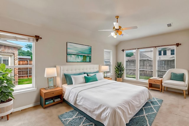 1221 Old Oak Trl, Flower Mound, TX 75028 - bedroom with light colored carpet, multiple windows, and baseboards