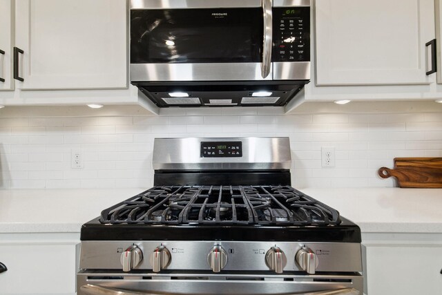 7205 Wildflower Way, Little Elm, TX 76227 - kitchen with stainless steel appliances, light countertops, white cabinets, and backsplash