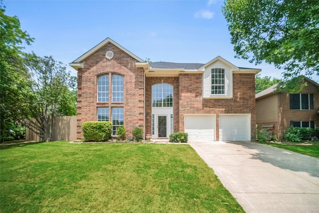 1100 Hyde Park Dr, Mckinney, TX 75069 - traditional-style house with brick siding, a garage, and concrete driveway