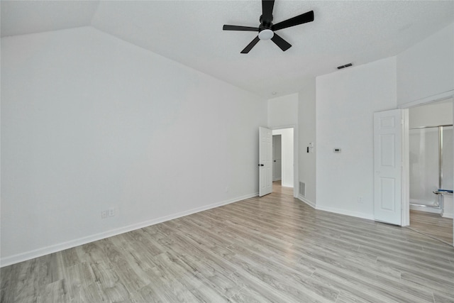 1100 Hyde Park Dr, Mckinney, TX 75069 - unfurnished bedroom with vaulted ceiling, light wood-style floors, ceiling fan, and baseboards
