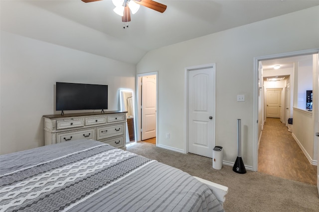 3504 Robin Rd, Ennis, TX 75119 - bedroom featuring light carpet, lofted ceiling, baseboards, ensuite bath, and ceiling fan